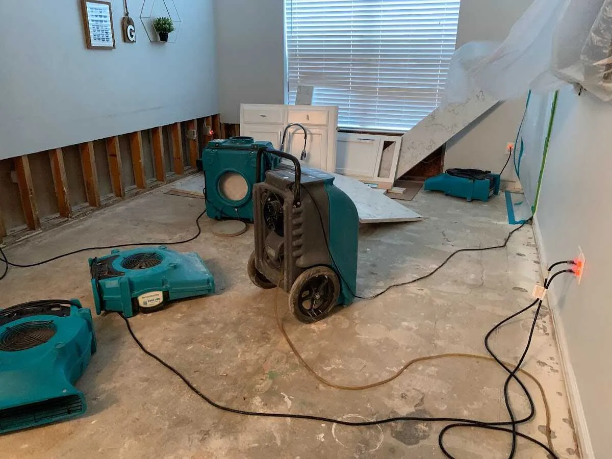 Dehumidifier in flood-cut room for Water Damage Restoration in Mila Doce